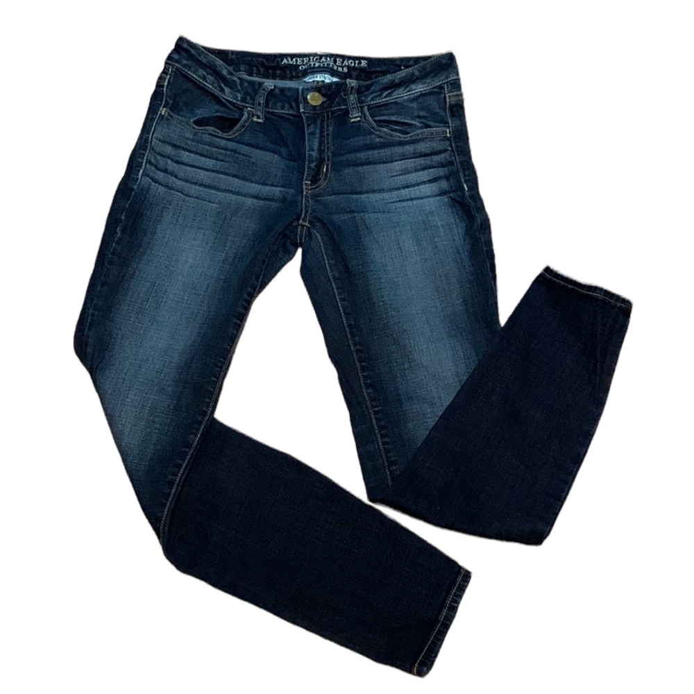 American Eagle Outfitters dark wash skinny jegging fitted w full pockets. Sz 4.